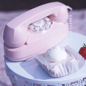 Pink telephone old style. Working house  phone